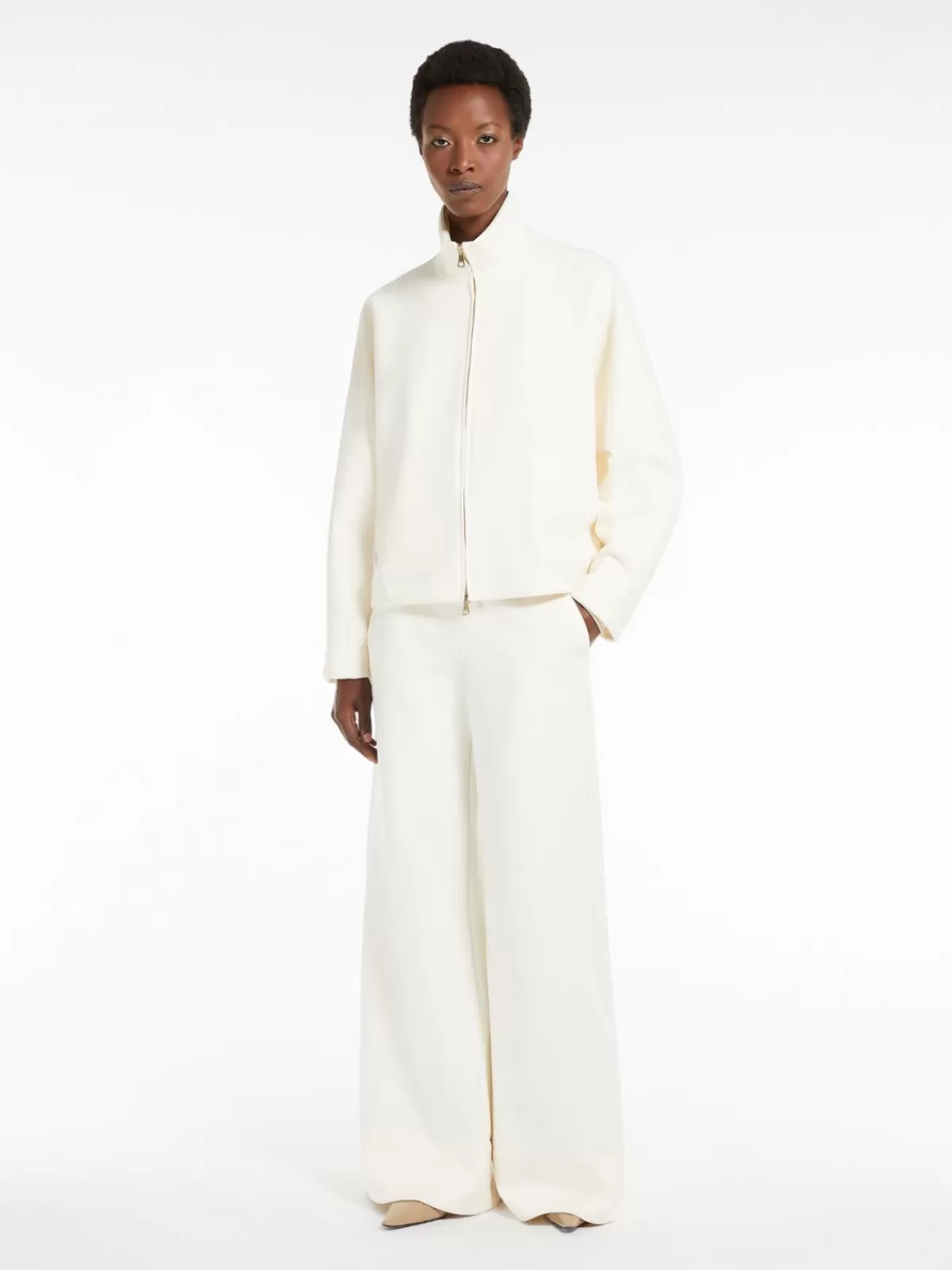 Max Mara - Pantalones Flare en Tejido Técnico de Punto - Estilo Cómodo y Moderno - Color Blanco Clásico