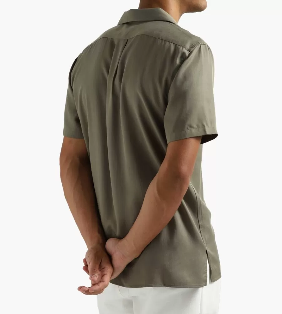 Camiseta Casual LIBERTINE para Estilo Urbano - Diseño Único en Oliva, Talla Completa con Aire Vintage. Envío Rápido Disponible