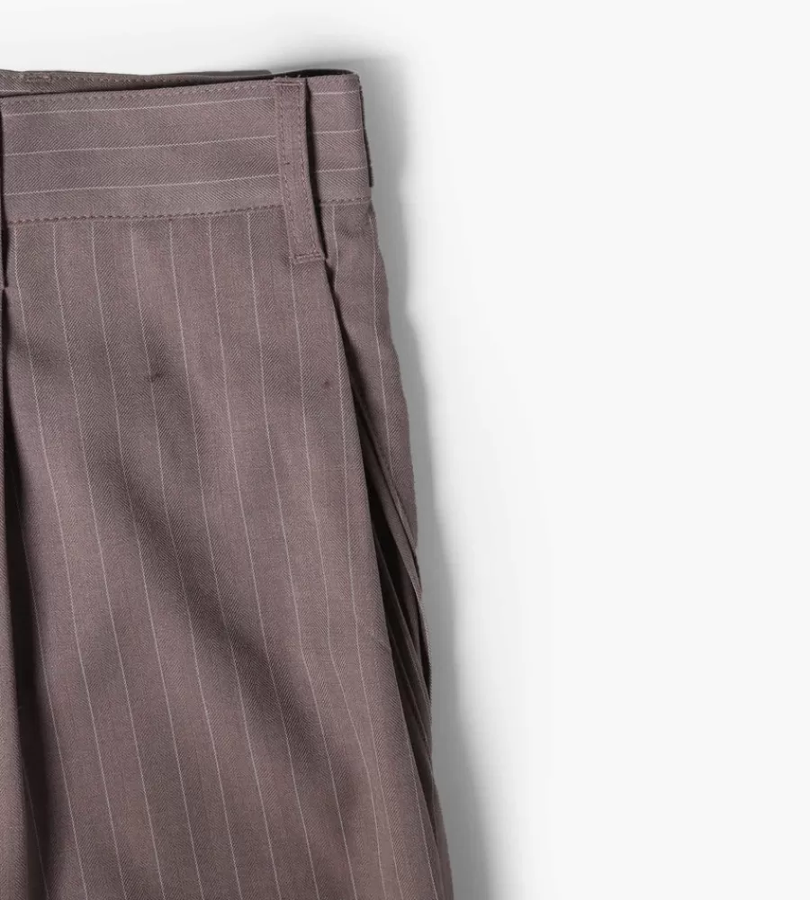 Pantalones Holgados STUSSY Rayados con Pliegues Detallados en Tono Marrón Claro