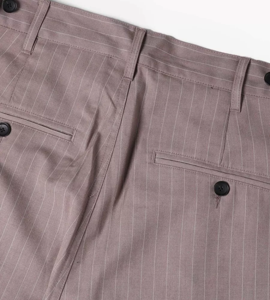 Pantalones Holgados STUSSY Rayados con Pliegues Detallados en Tono Marrón Claro